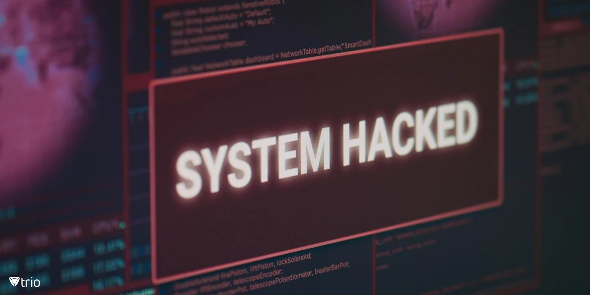 A warning sign reading system hacked on a computer screen.