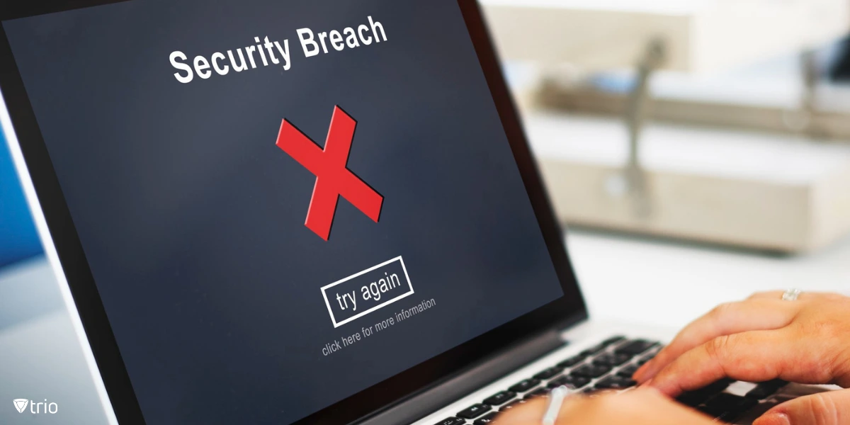 Security breach sign appearing on a laptop screen signifying the benefits of Just-in-Time access management in reducing security breaches