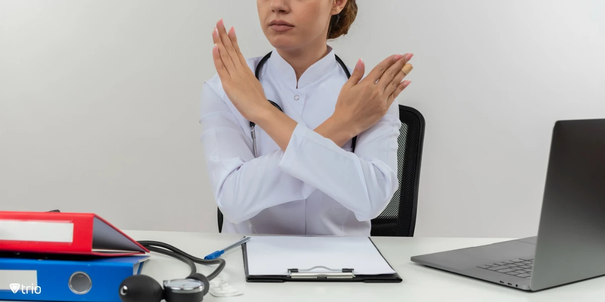 Medical supervisor crossing her arms signifying the severity of HIPAA Violation Consequences for Employees