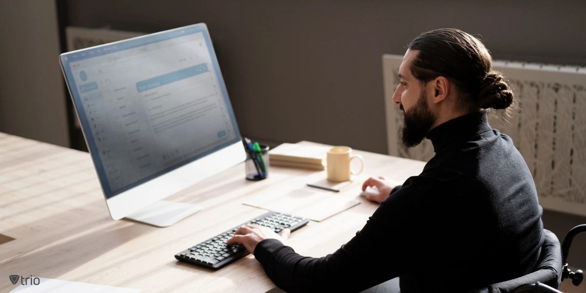 Medium shot of an IT admin working at desk