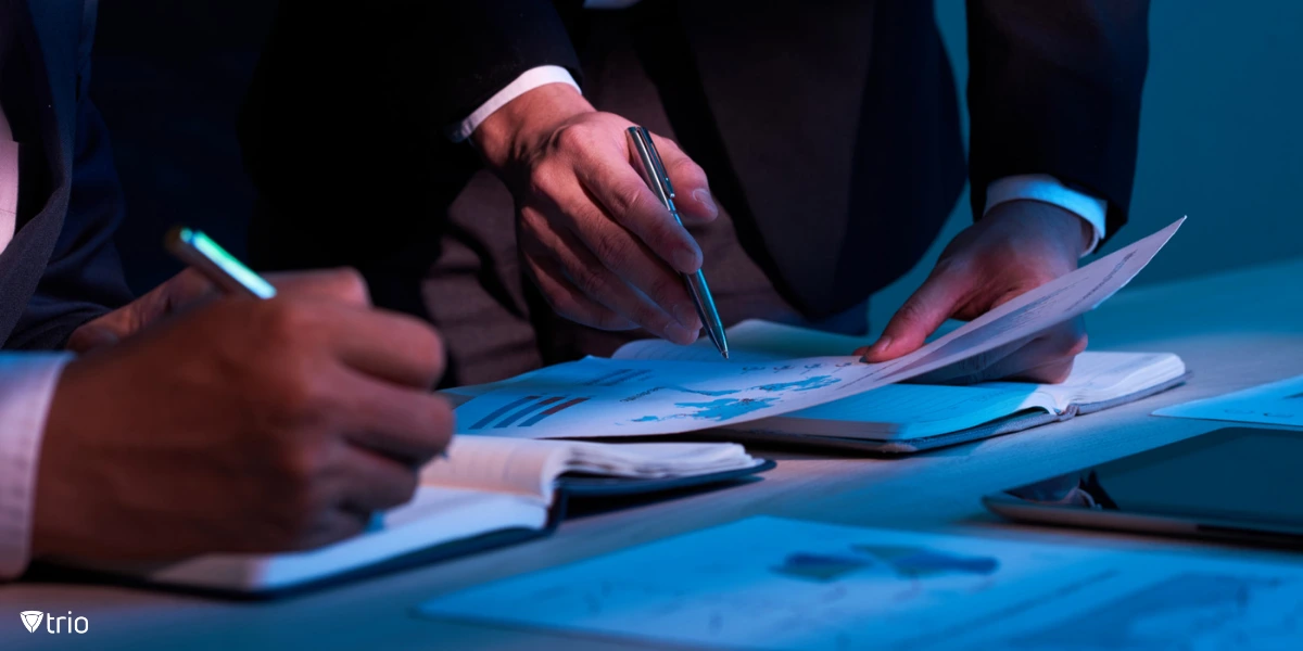 Two businessmen doing paperwork