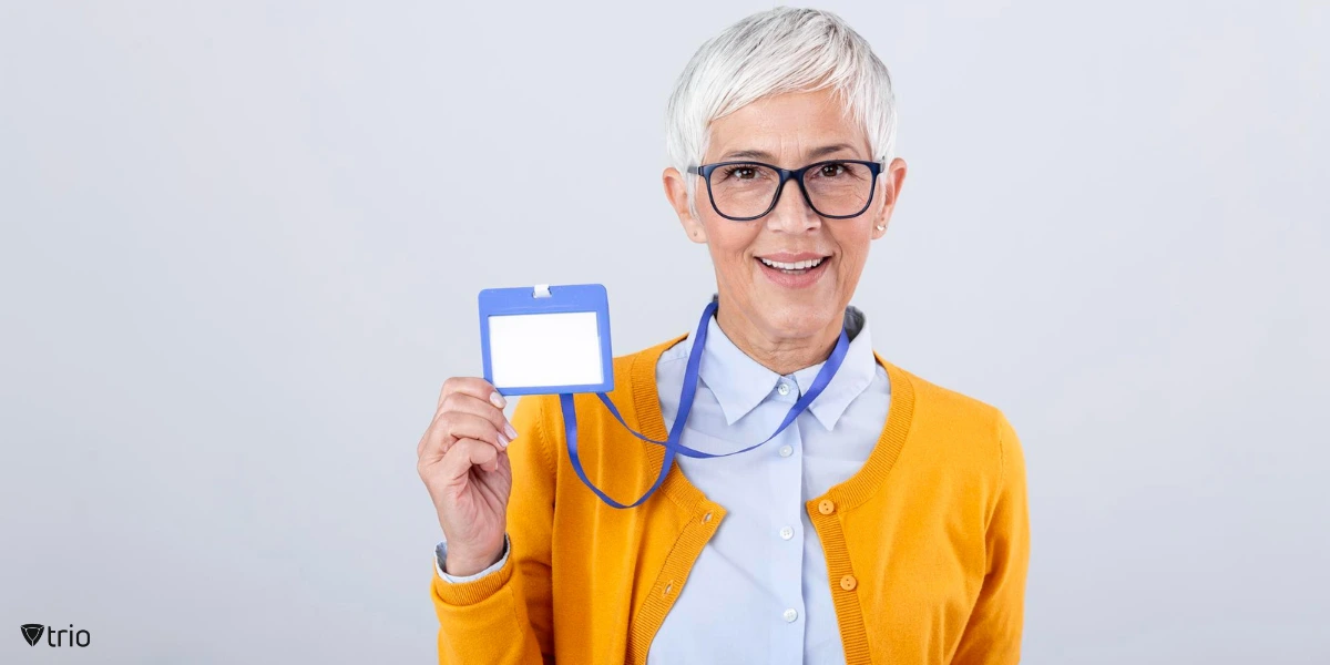 A woman wearing an ID badge around her neck.