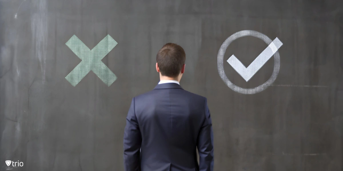 Businessman standing in front of wall with check mark and cross mark