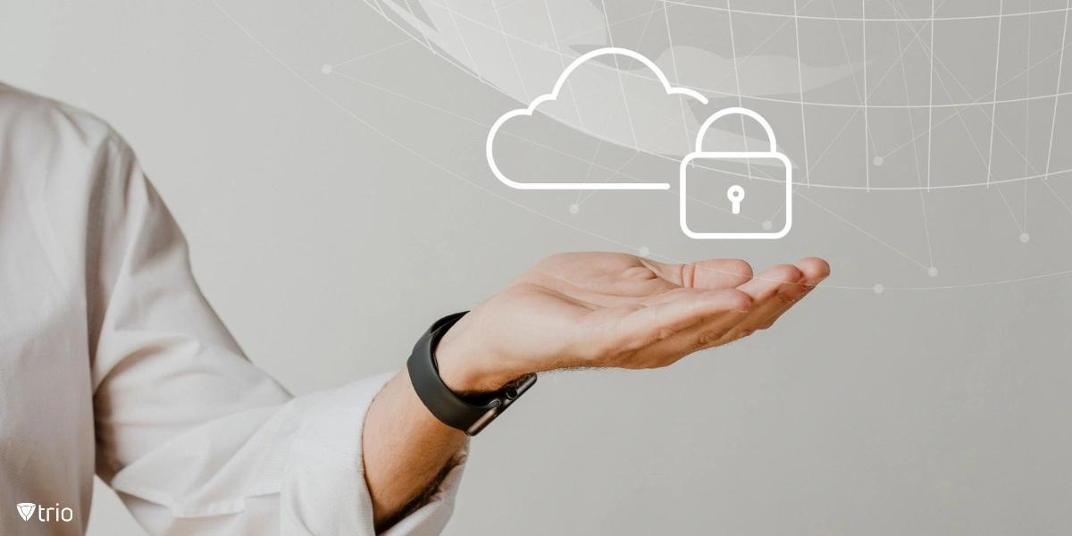 A hand holding a digital cloud icon and a padlock symbol.