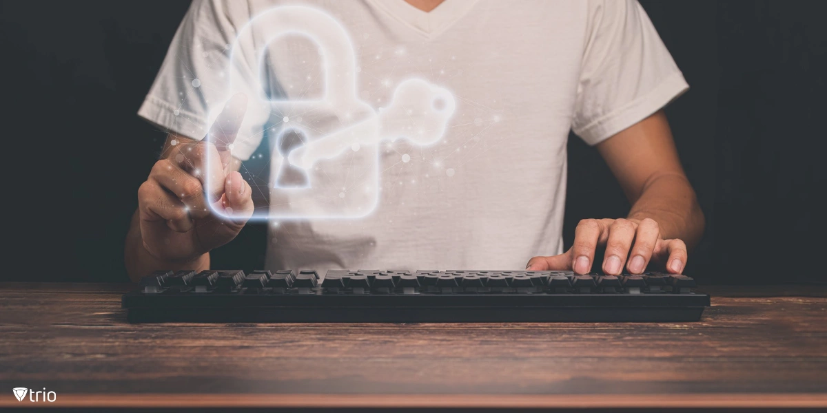 man using keyboard with hologram of lock icon