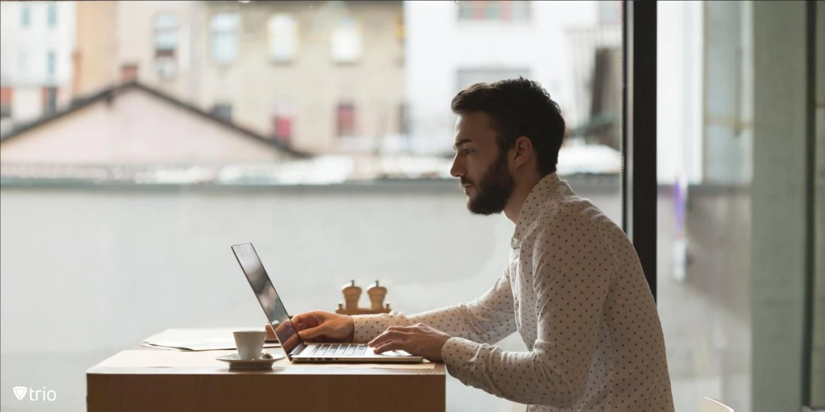 Man using laptop on desk