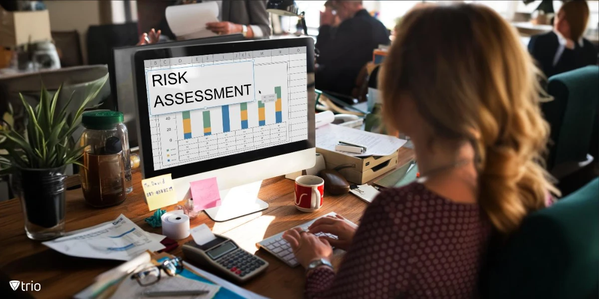 Woman in front of a computer that says “Risk Assessment