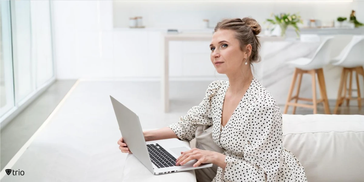 Businesswoman thinking and working from home with her laptop