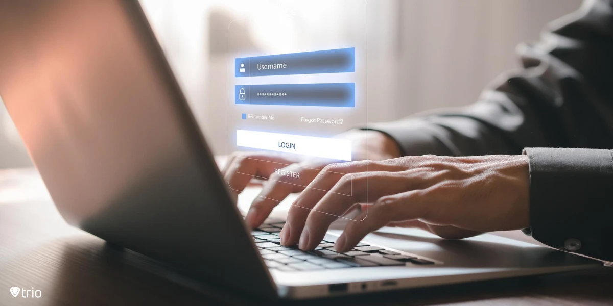 hands of a businessman using laptop with login screen popping out of it